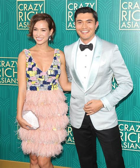 henry golding and wife photos.